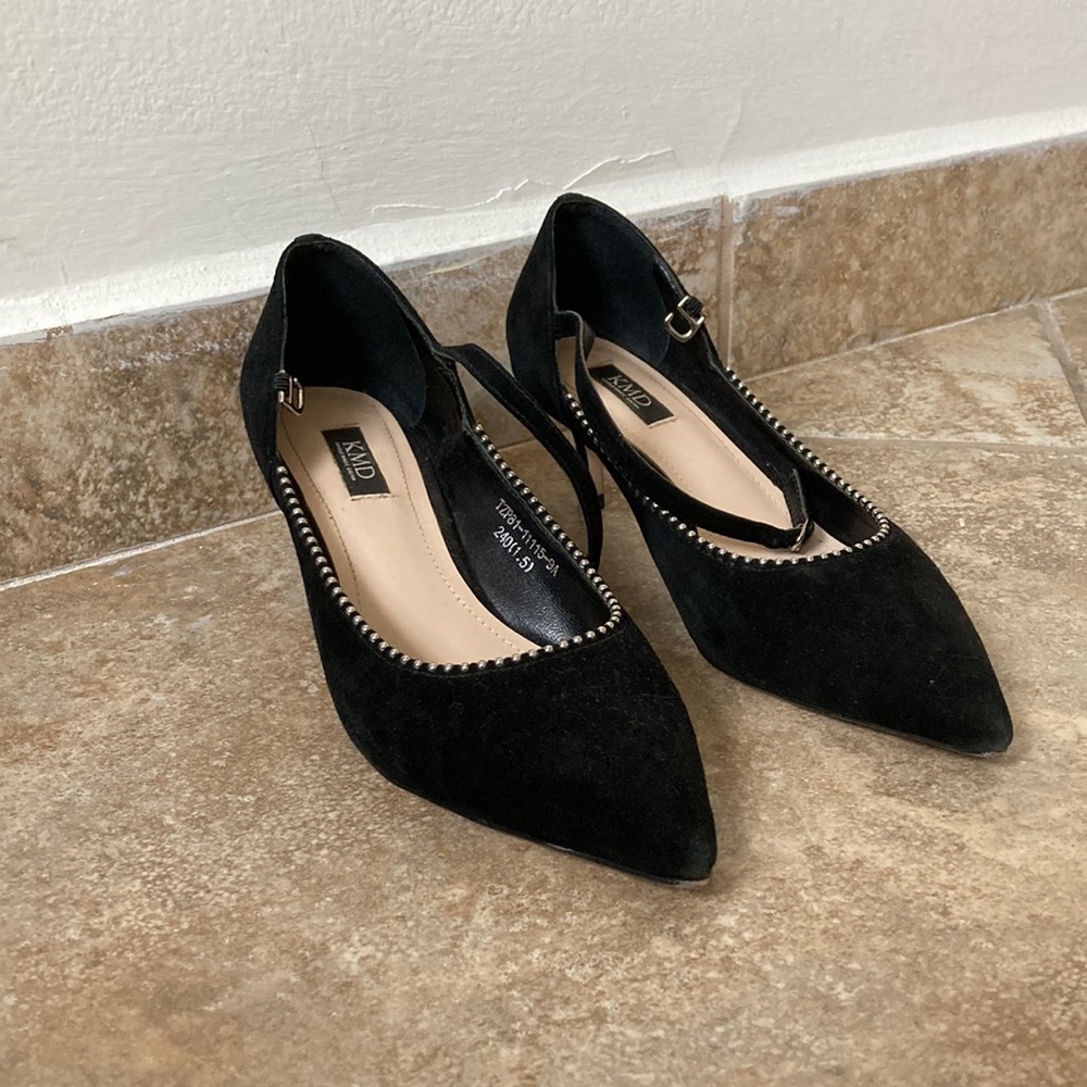 Short suede heels with detailing and strap at ankles